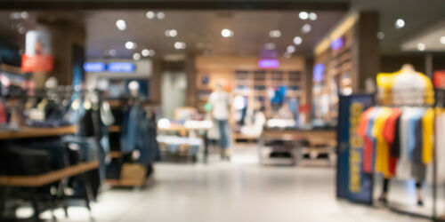 Abstract blur clothing store in modern shopping mall defocused background